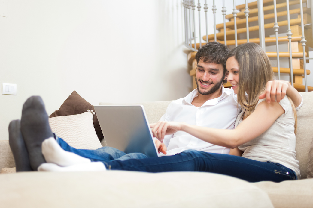 Couple looking at latop