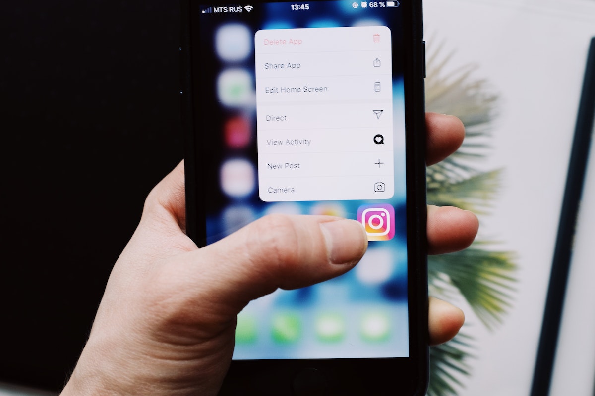 Person Holding Black Smartphone