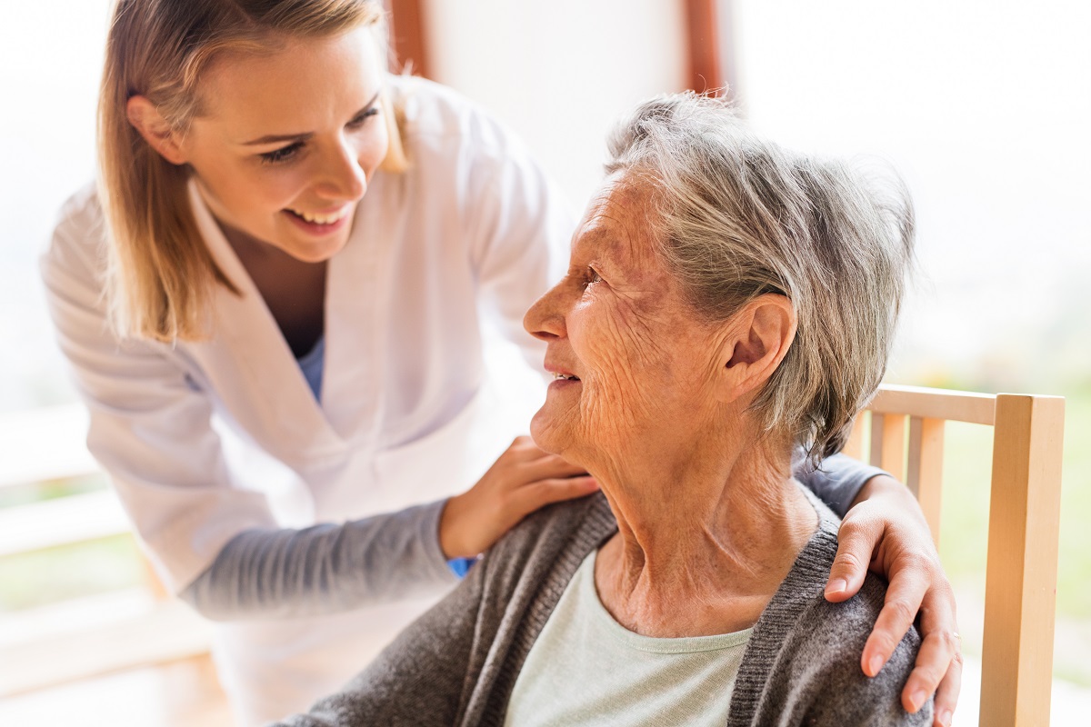 Woman taken care by a nurse at home