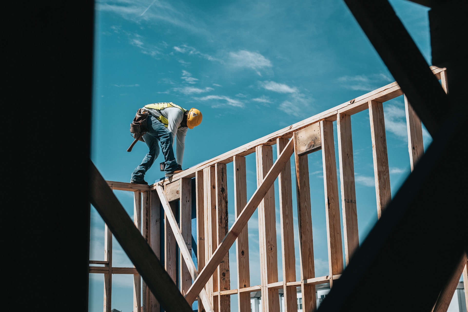 man at the top wearing safety gears